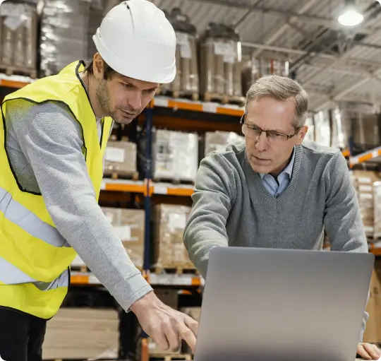 men-warehouse-working-laptop